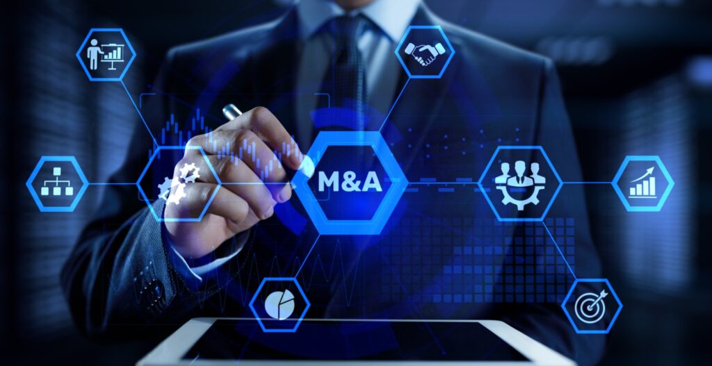 Hand holding a Merger & Acquisitions